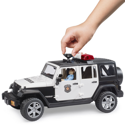 Spielzeugauto Jeep Wrangler mit Polizist und Ausstattung, 1:16